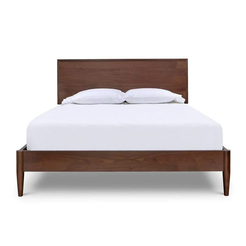 Wooden bed with white bedding on a white background